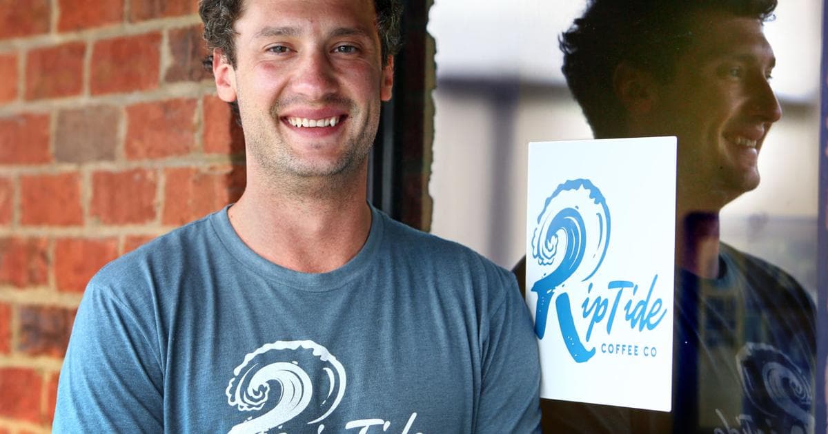 Roberto at the Riptide Coffee Co storefront